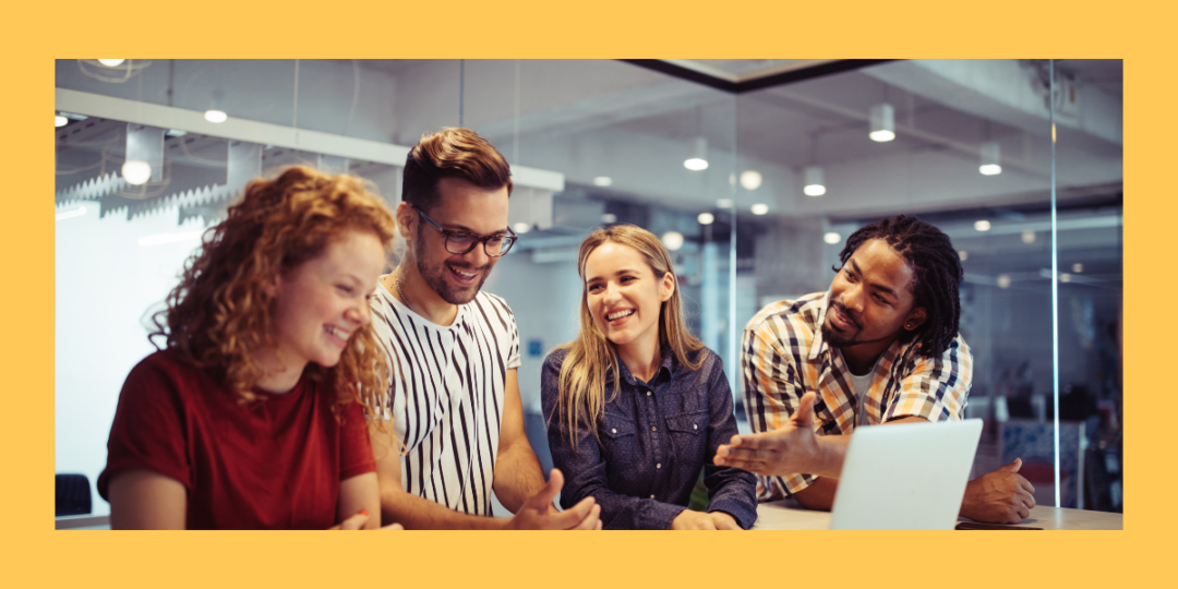 Employees discussing company culture in an office.